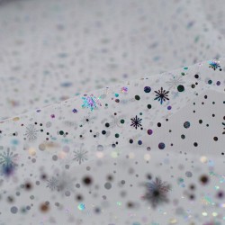 Tela de tul topos estrellas detalle