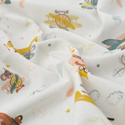 Tela de algodon animales en avionetas textura