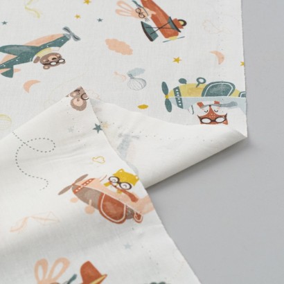 Tela de algodon animales en avionetas reves