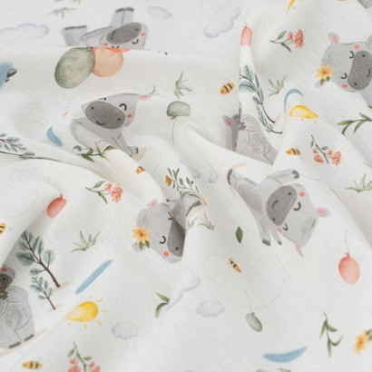 Tela de algodon rinocerontes felices textura