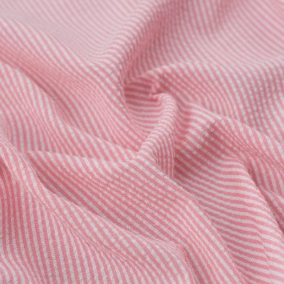 Tela de seersucker mil rayas textura rosa fluor