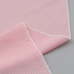Tela de seersucker mil rayas reves rosa fluor