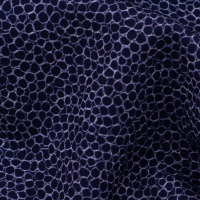 Tela de sarga animal print detalle