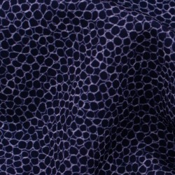 Tela de sarga animal print detalle