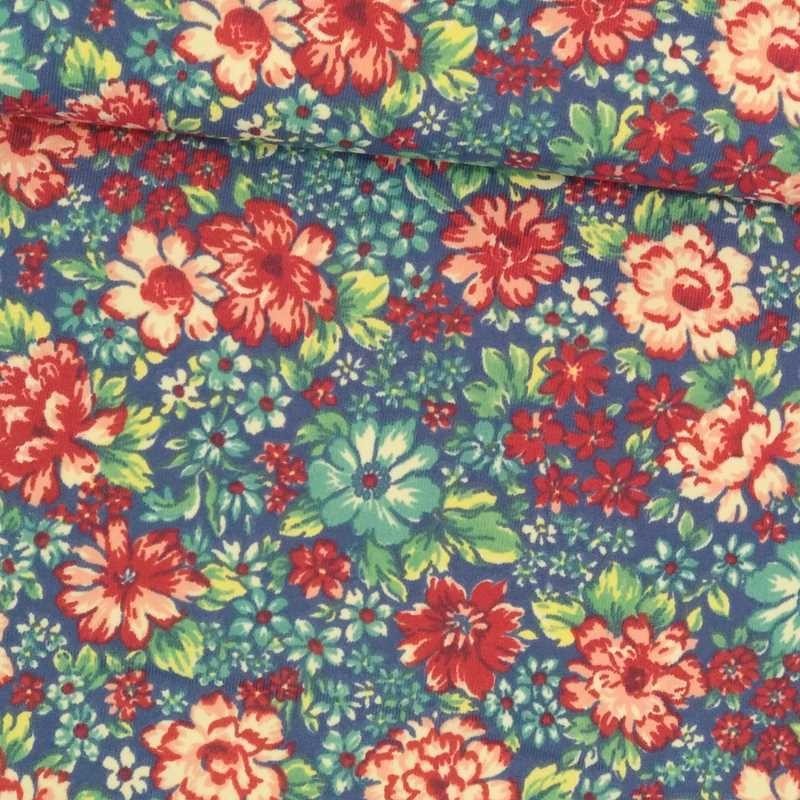 Tela de lycra azul flores de colores tubo Tela de lycra azul flores de colores tubo
