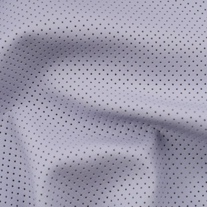 Tela de cuero sintético perforada detalle