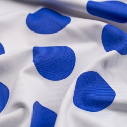 Tela de licra topos grandes detalle